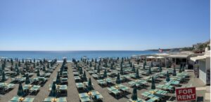 Italy’s famous beaches see a sharp drop in summer visitors due to rising costs and stronger competition.