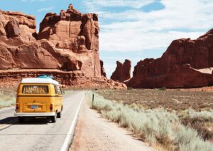 Scenic highway through mountains under open sky representing outdoor and RV travel